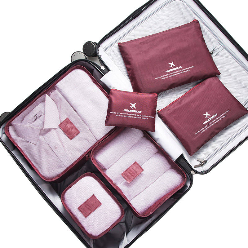 ტანსაცმლის შესანახი ჩანთის კომპლექტი