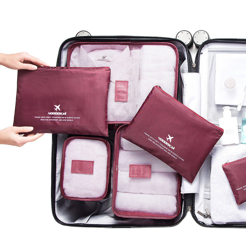 ტანსაცმლის შესანახი ჩანთის კომპლექტი